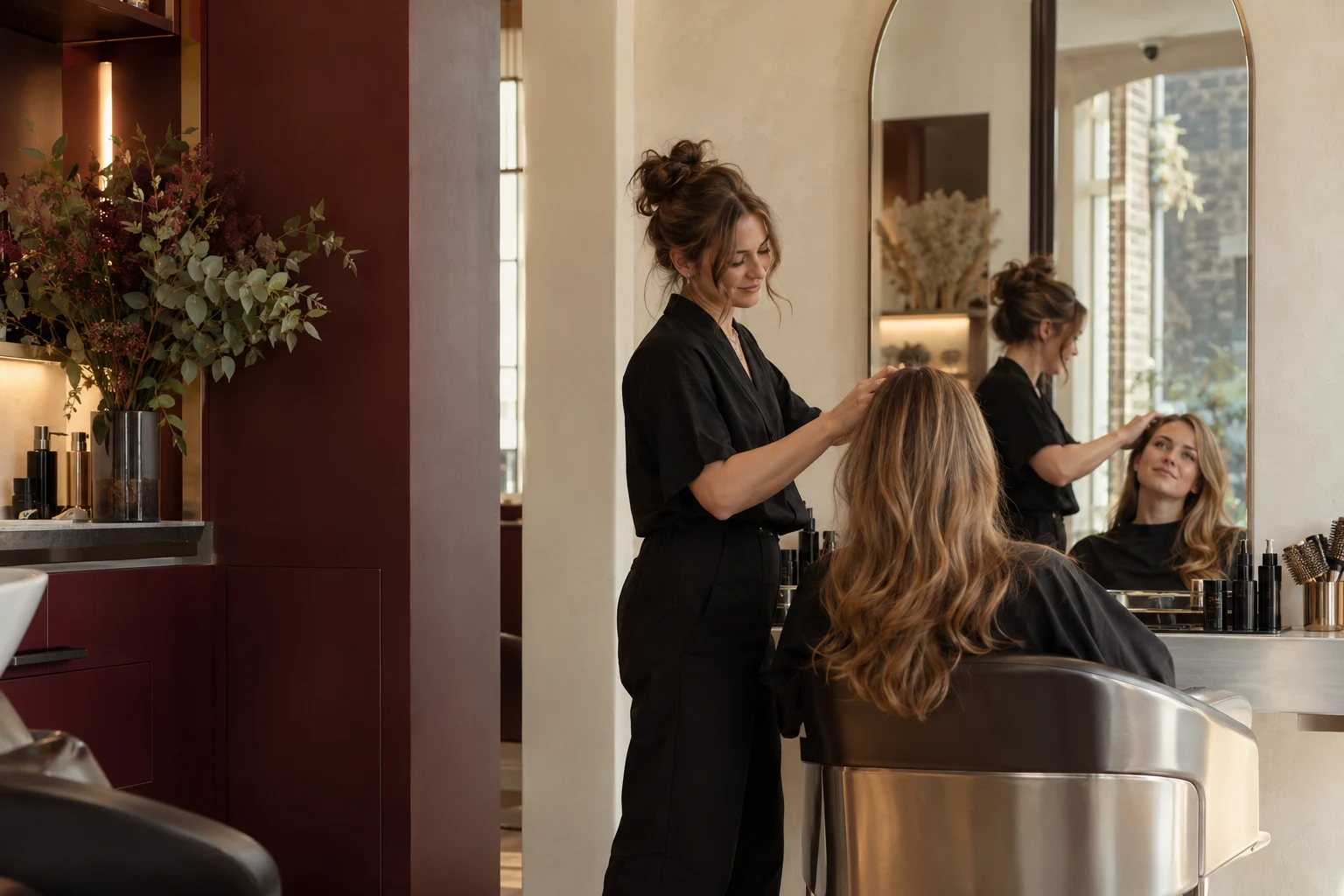A salon professional looking after a client in a contemporary beauty salon
